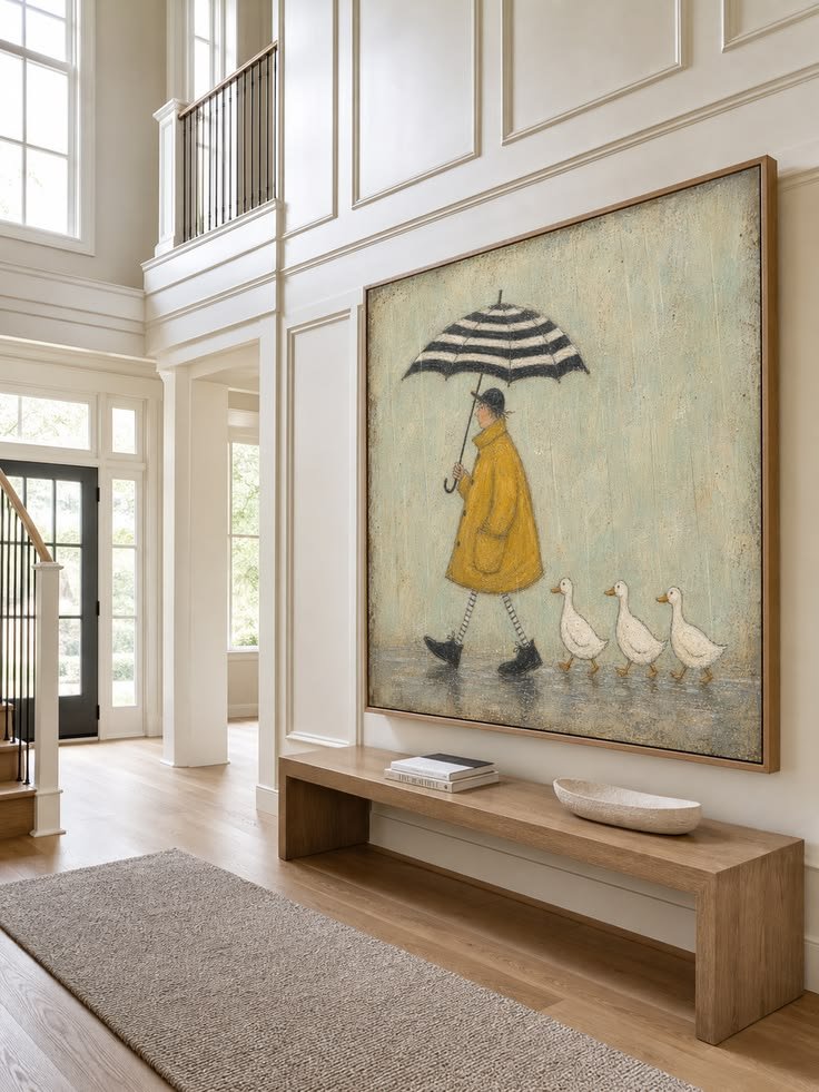 Large colorful artwork above entryway console
