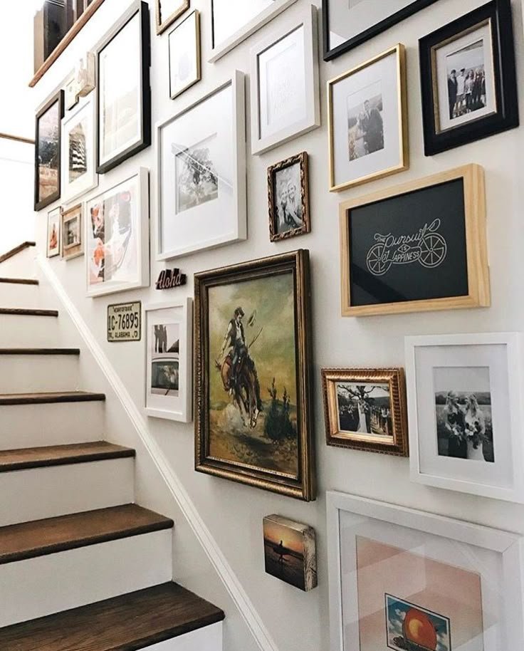 Full staircase with frames following stair angle
staircase gallery wall decor