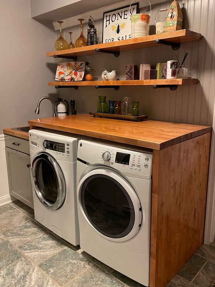 Cozy laundry room with warm wood cabinets