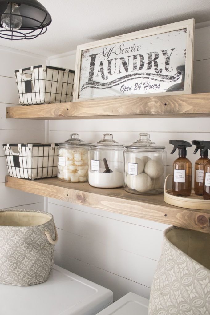 Laundry room with pretty utility storage containers