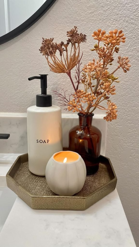 Simple seasonal decor displayed on top of a bathroom toilet tank