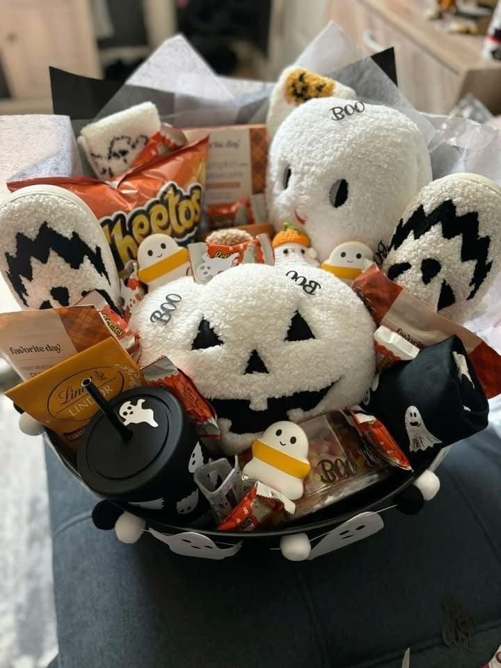 Black and white gothic Halloween basket with black mug and skull decor