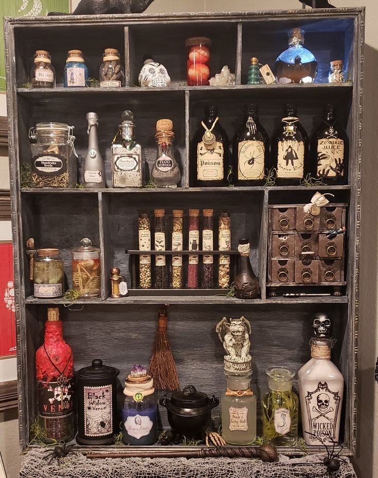 Halloween potion bottles styled on a wooden tray