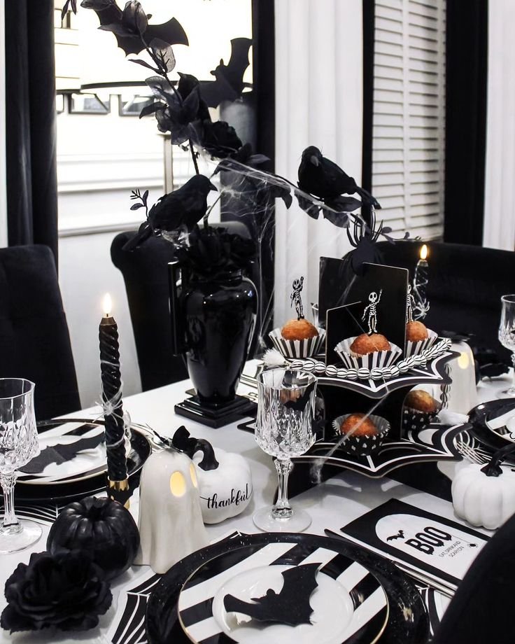 Black and white Halloween table centerpiece with dried flowers