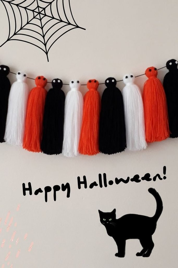 Handmade Halloween tassel garland on a mantel