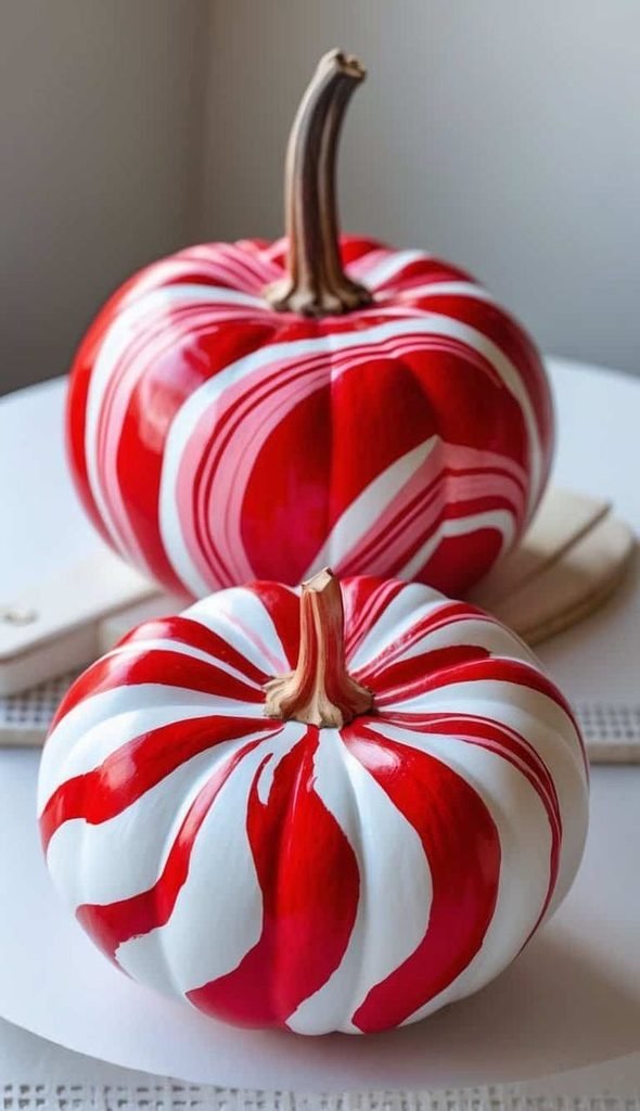 Colorful striped painted pumpkins for Halloween