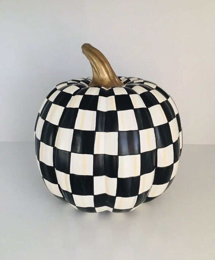 Black and cream checkered painted pumpkin