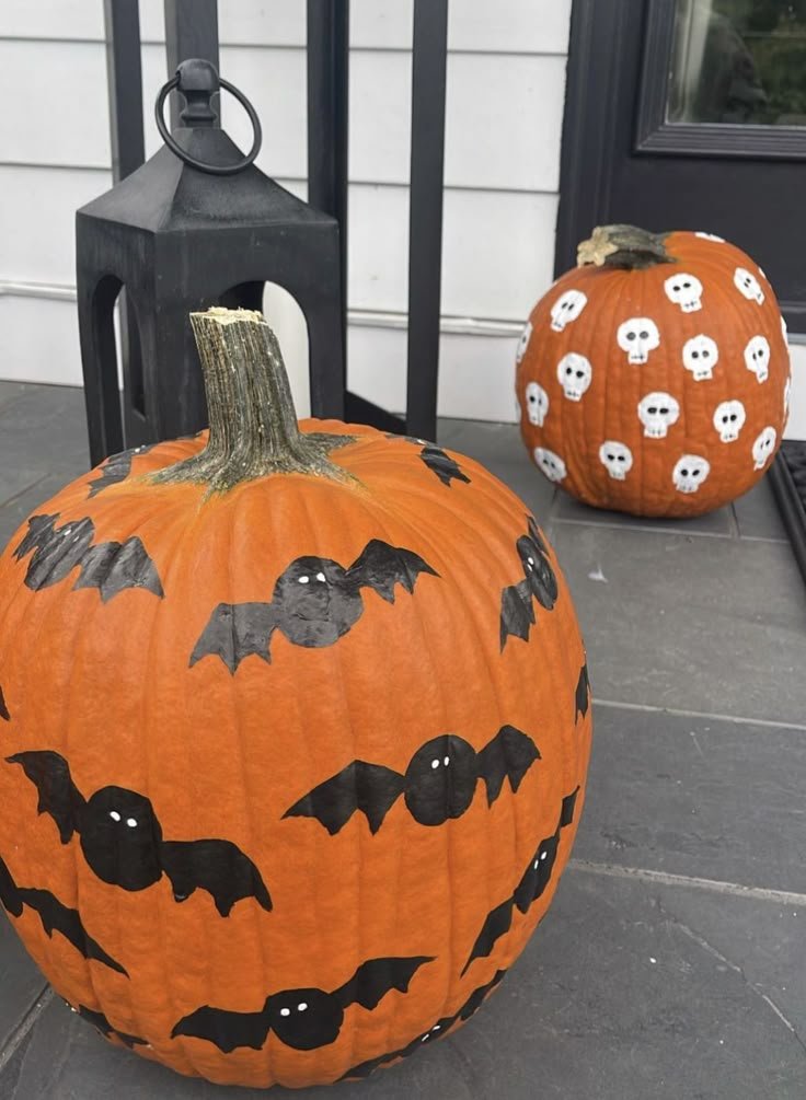 Charcoal pumpkin painted with flying bats