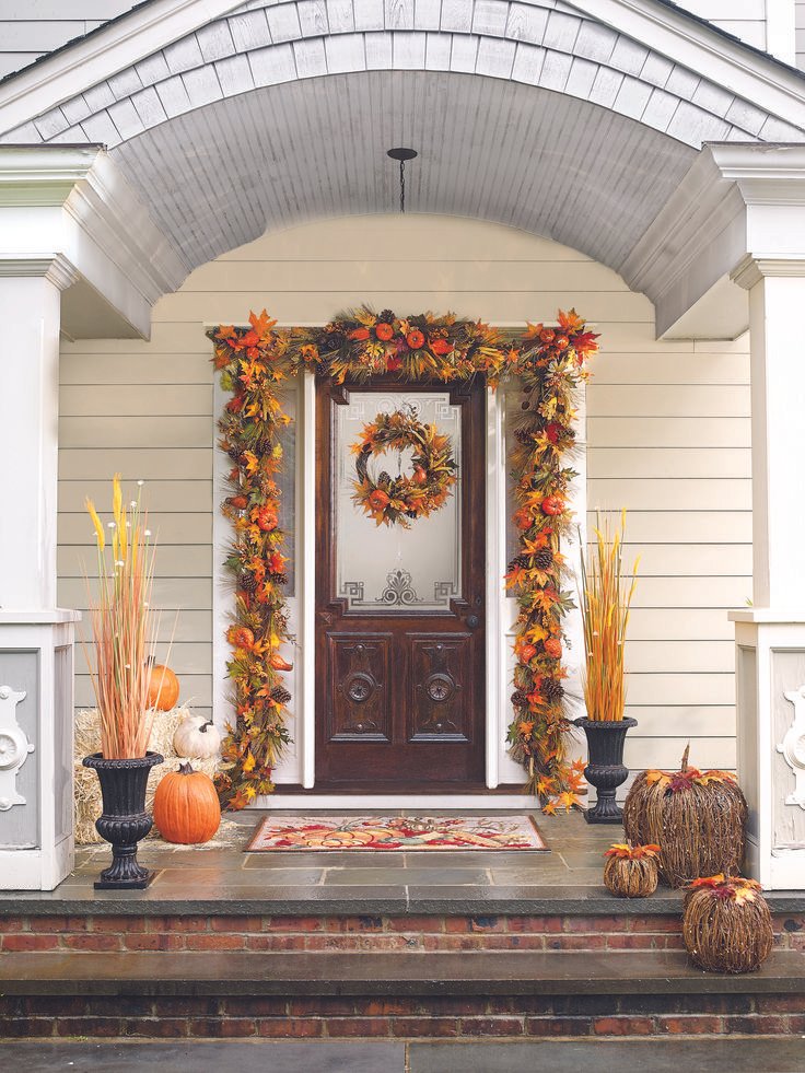 Autumn garland framing a fall front door