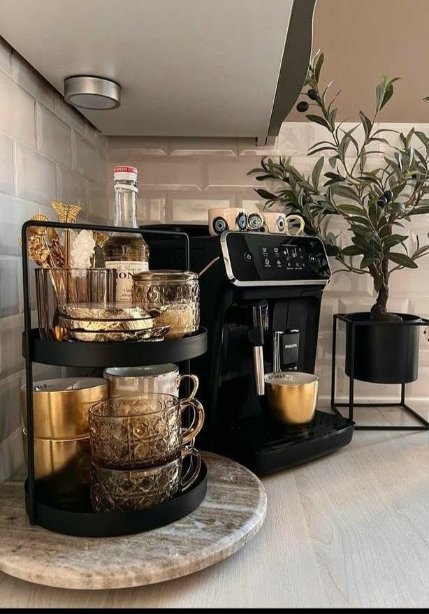Coffee station arranged on a wooden beverage tray with an espresso machine, mug, coffee jar, and spoon holder