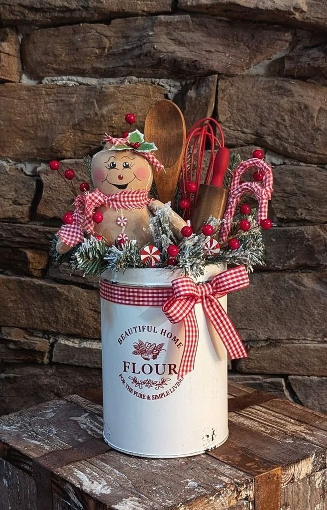 Vintage Christmas mason jar centerpiece with greenery, red berries, antique ornaments, and velvet ribbon.