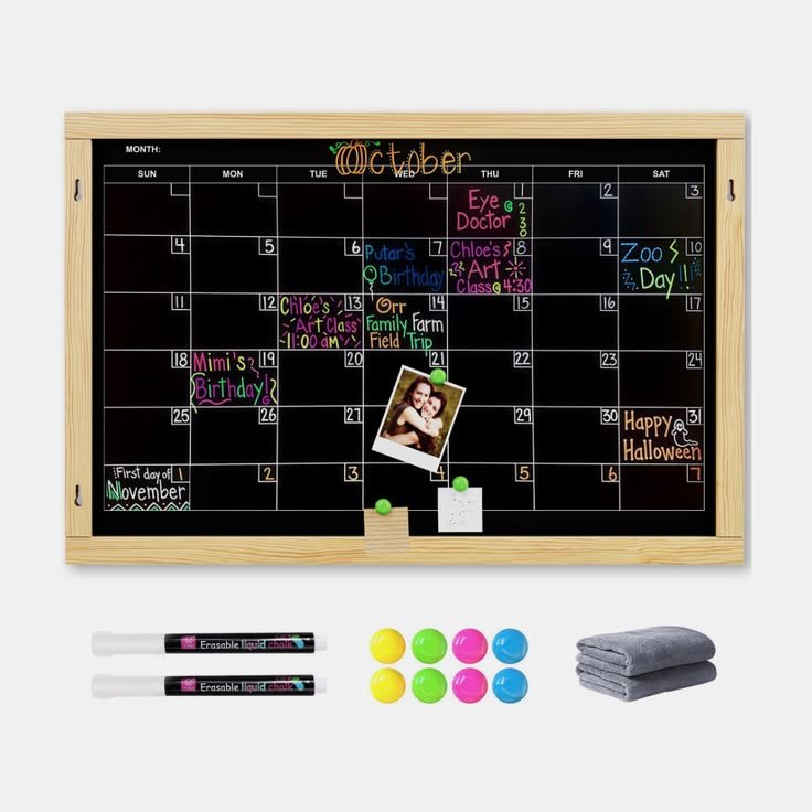 Black October dry erase calendar with white lettering and Halloween accents