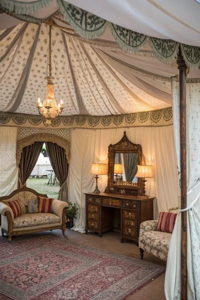 Cream fabric panels arranged in a tent-inspired ceiling canopy above a neutral bedroom.